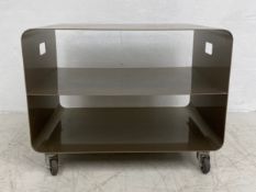 A Muller Mobelfabrikation painted metal Mobile Line unit with three tiers on castors with maker's