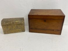 A late 19th century repousse brass stationery box along with a fitted 19th century mahogany example.