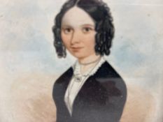 A 19th century miniature watercolour portrait in glazed rosewood frame. 18x16cm