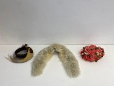 A mixed collection to include a ladies' feather hat, fur collar and floral bonnet.