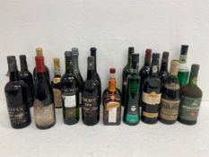 A miscellaneous collection of unopened bottles, port, sherry etc. Nineteen bottles.