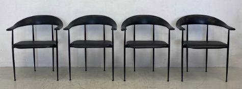 A set of four 1980s Italian dining armchairs each having a black rubber back and seat raised on
