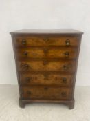 A mid 20th century Georgian style walnut chest of five graduating drawers with quarter veneered