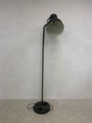 A metal retro styled floor standing lamp. H.184cm. (Low cost in-house delivery available).