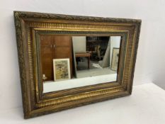 A 19th century giltwood and gesso wall mirror. 77x57cm.