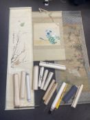 A collection of sixteen Chinese scrolls, handpainted and signed. 190cm (Longest).