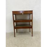 An Edwardian mahogany vitrine with glazed upper section with lift out tray above two further