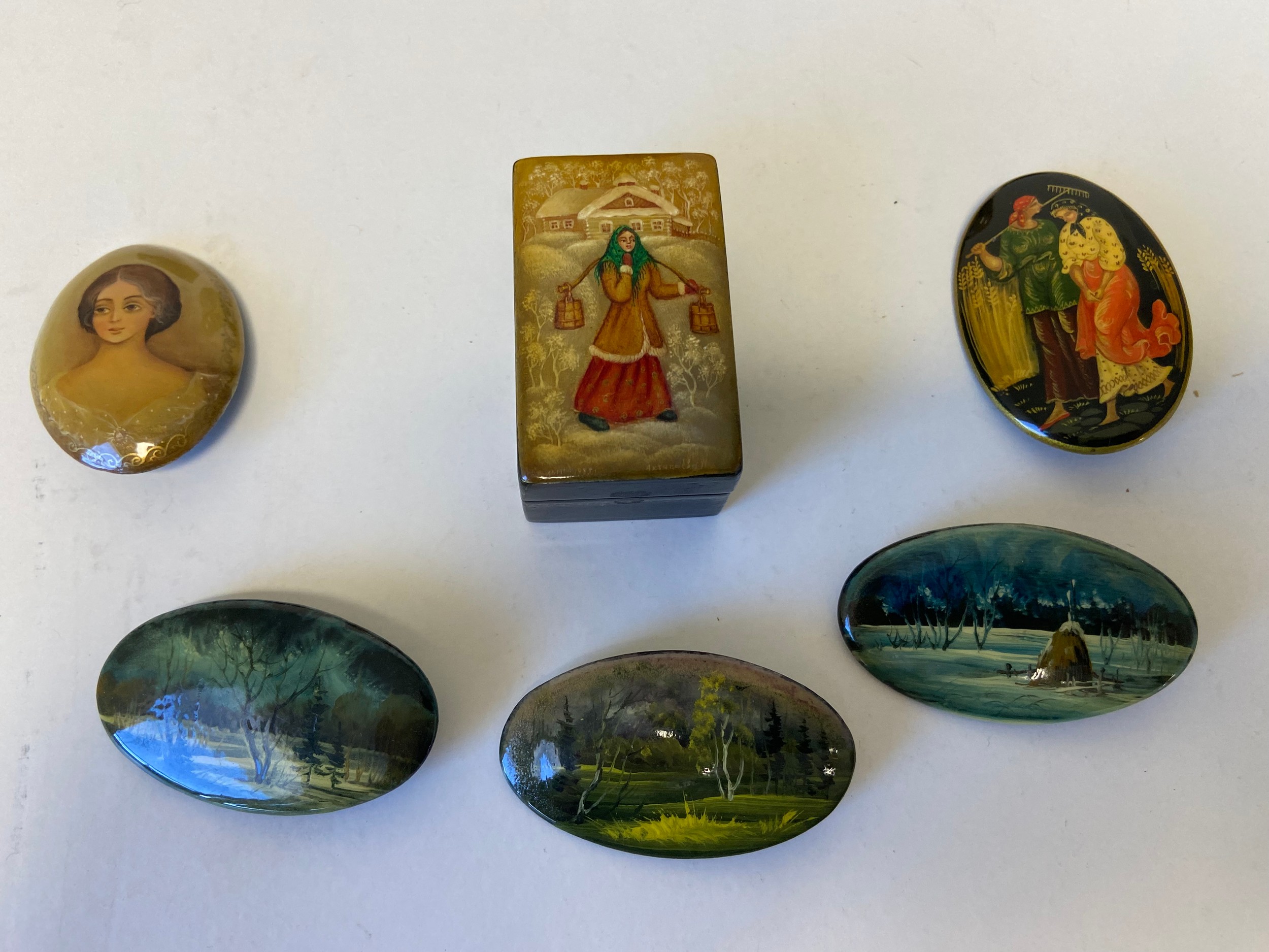 A collection of five signed and hand painted Russian papier mache oval pin badges along with three - Image 4 of 9