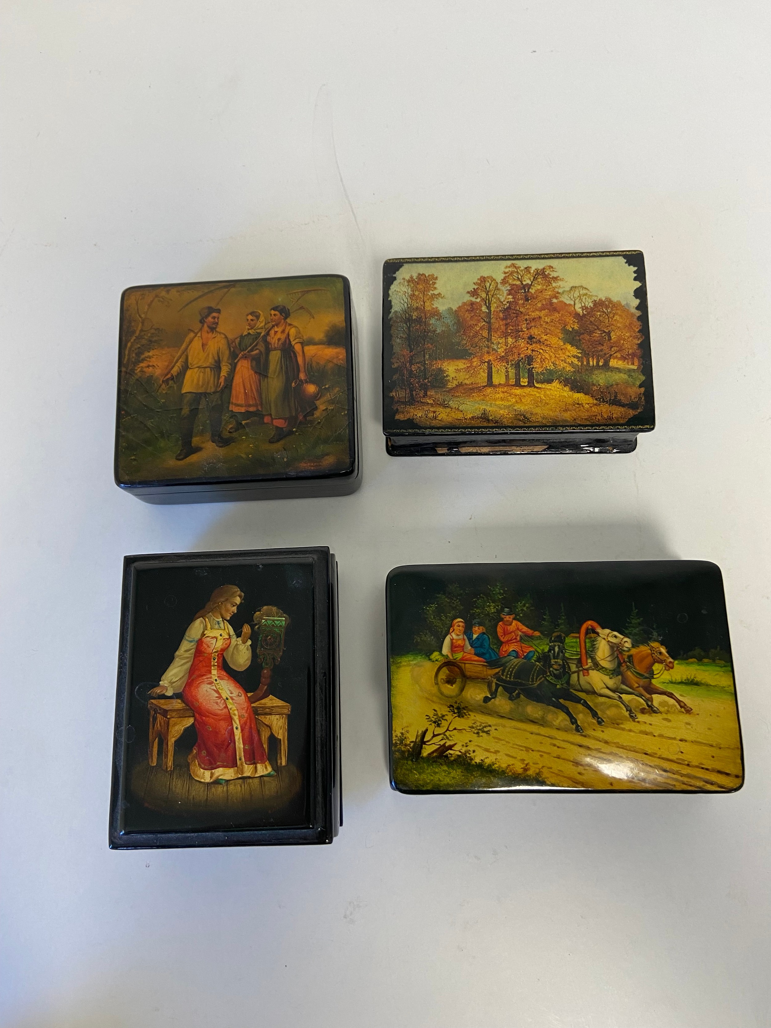 A collection of eight lacquered Russian papier mache dressing table boxes with hand painted - Image 2 of 4