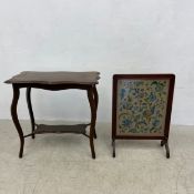 A late 19th century occasional table and a tapestry firescreen in a glazed mahogany frame. H.76 W.