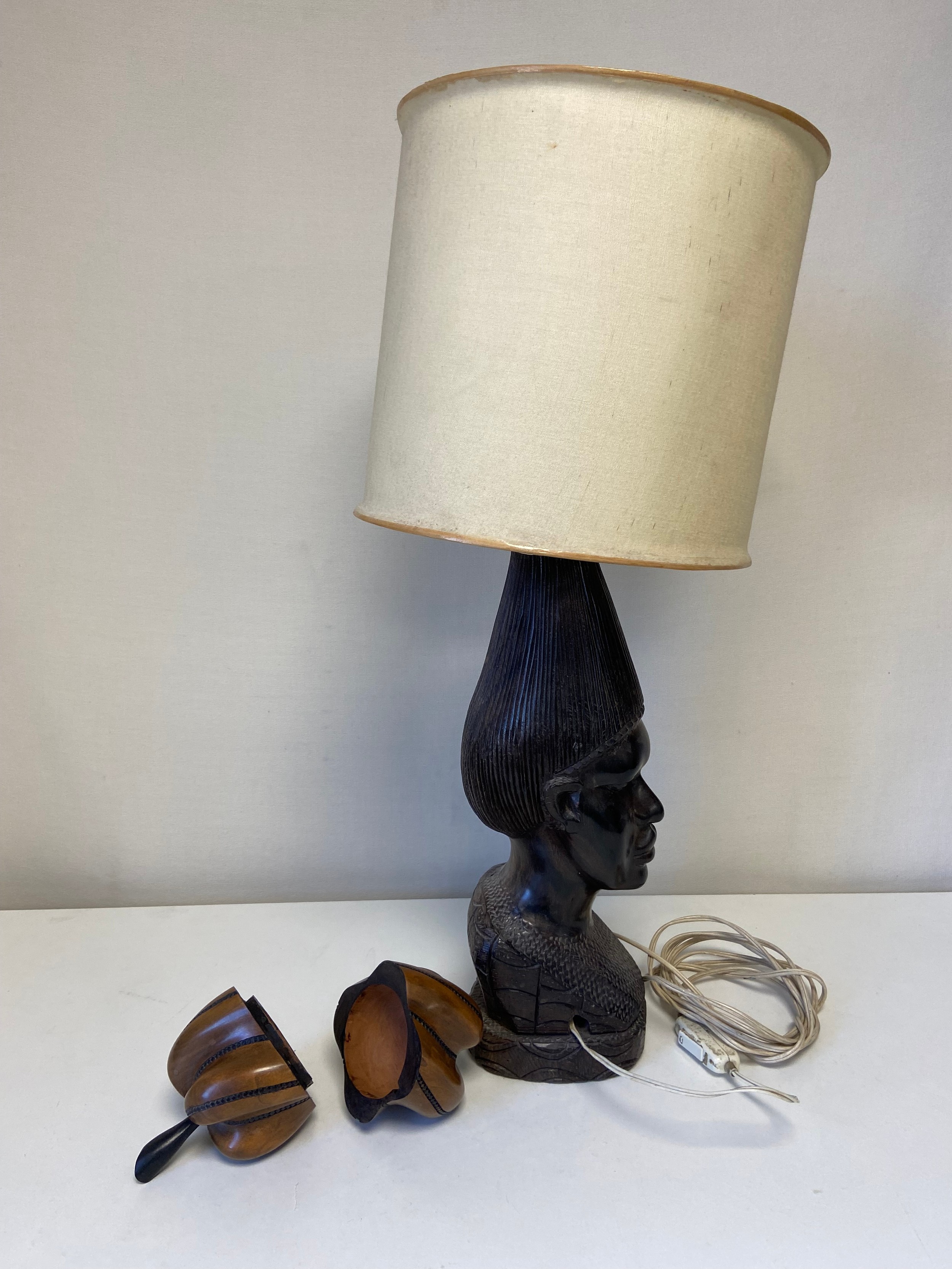 A treen lidded pear along with a carved hardwood African Tribal table lamp. H.64cm. (Lamp). - Image 2 of 2