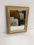 A small gilt framed wall mirror. 43x53cm.