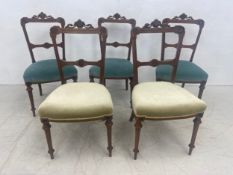 A set of five late 19th century walnut dining chairs with ebony and satinwood flowerhead inlay. (Low