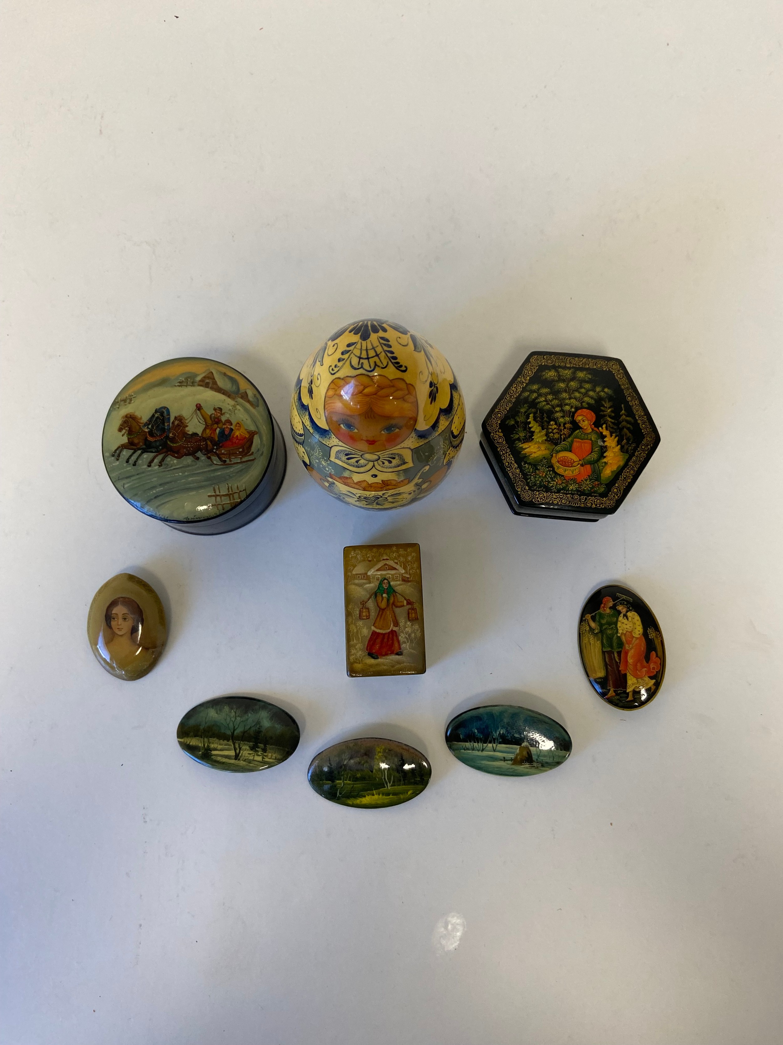 A collection of five signed and hand painted Russian papier mache oval pin badges along with three - Image 2 of 9