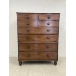 A Regency mahogany two section chest on chest with four short drawers above four long drawers on