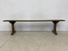 A 19th century elm bench on trestle supports. H.47 W.198 D.20cm (Low cost in-house delivery