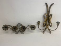A vintage bronze two branch wall light of scrolling ribbon form along with a mid-century metal