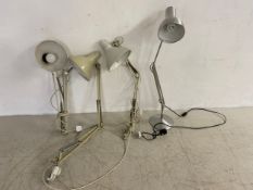 Four vintage articulated anglepoise style clamp fitting desk lamps by by One Thousand & One Lamps