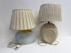 Two 1980's vintage porcelain table lamps with their shades, one marked to it's base. H.64cm. (