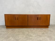 A mid-century teak G Plan low sideboard. H.54 W.162 D.46cm.