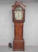 A Georgian oak longcase clock with 8 day movement, the painted dial with subsidiary seconds dial and