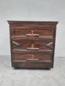 A Jacobean oak chest of three long drawers with lozenge moulded fronts. H.84 W.75 D.62cm