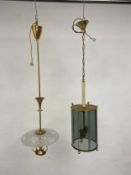 A mid-century Italian ceiling light with etched frosted glass shade and a similar smoked glass