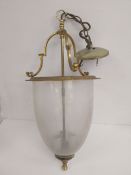 A brass Art Nouveau style ceiling light with conical frosted glass shade. H.67 plus 20cm chain.
