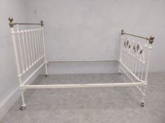 A Victorian brass and iron double bedstead to take a 4' 6