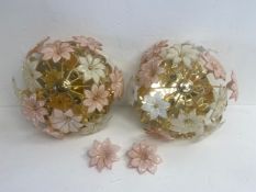 A pair of mid-century wall or ceiling lights in brass with glass flowerhead decoration. (With two