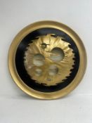A large 1970's vintage wall art style light in the form of a decorative pierced gilt metal