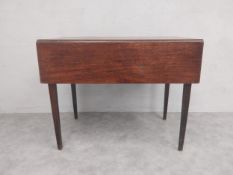 A 19th century drop flap mahogany Pembroke table with frieze drawer on square section tapering legs.