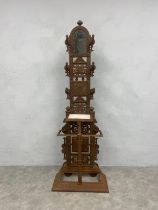 A Victorian cast iron hallstand fitted with mirror and marble shelf with foundry mark to the back.