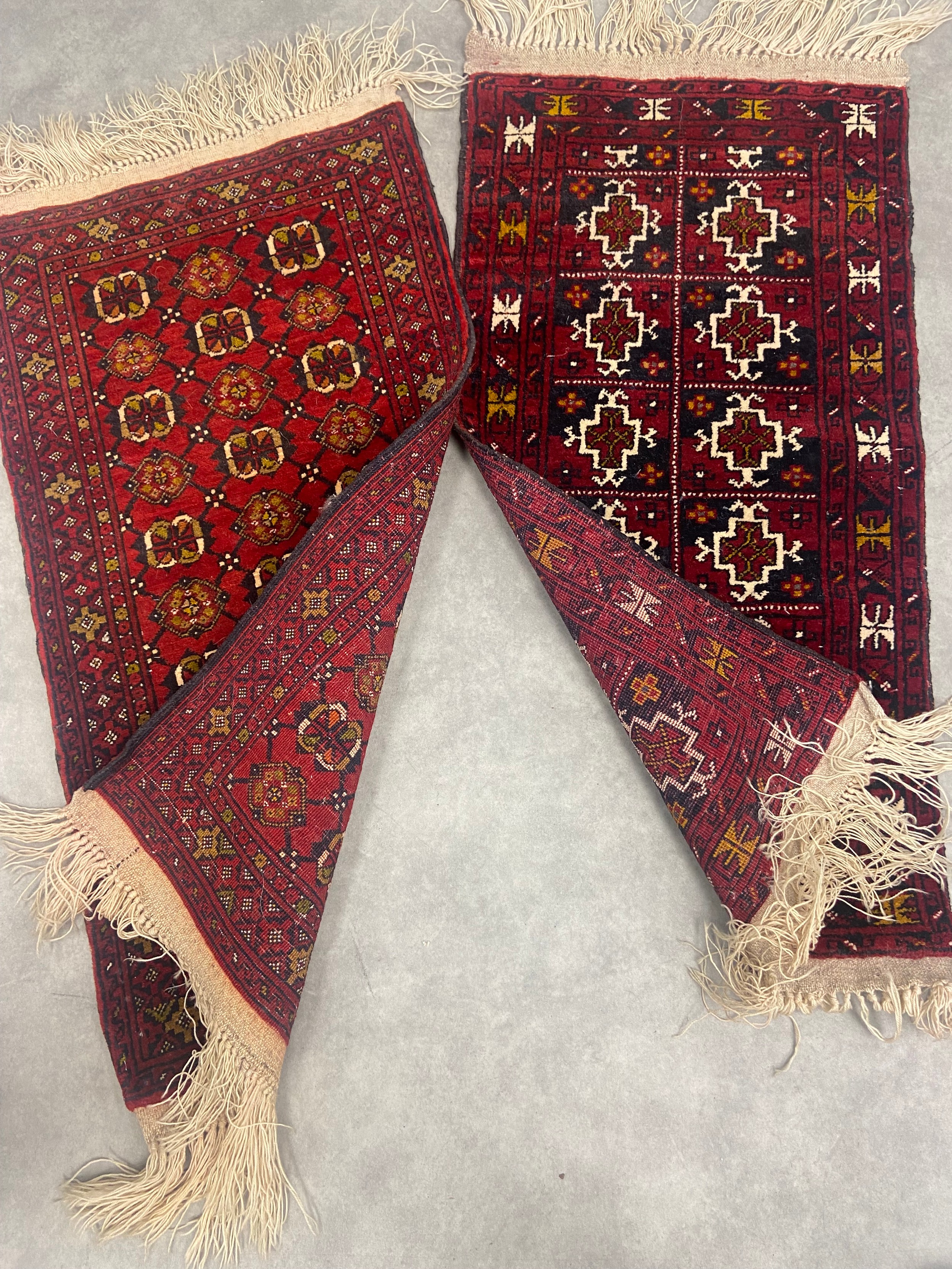 Two small Bokhara mats with repeating medallions on burgundy grounds. 120x56cm. - Image 3 of 3