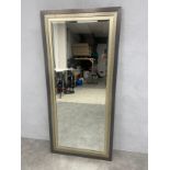 A contemporary dressing mirror in a stepped painted frame with bevelled plate. 150x70cm.