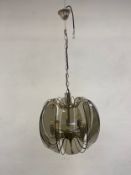 A mid-century Italian ceiling chandelier with smoked glass panels and eight branches. H.98cm.