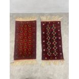 Two small Bokhara mats with repeating medallions on burgundy grounds. 120x56cm.