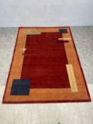 A contemporary Tibetan wool rug with abstract geometric design. 240x170cm.
