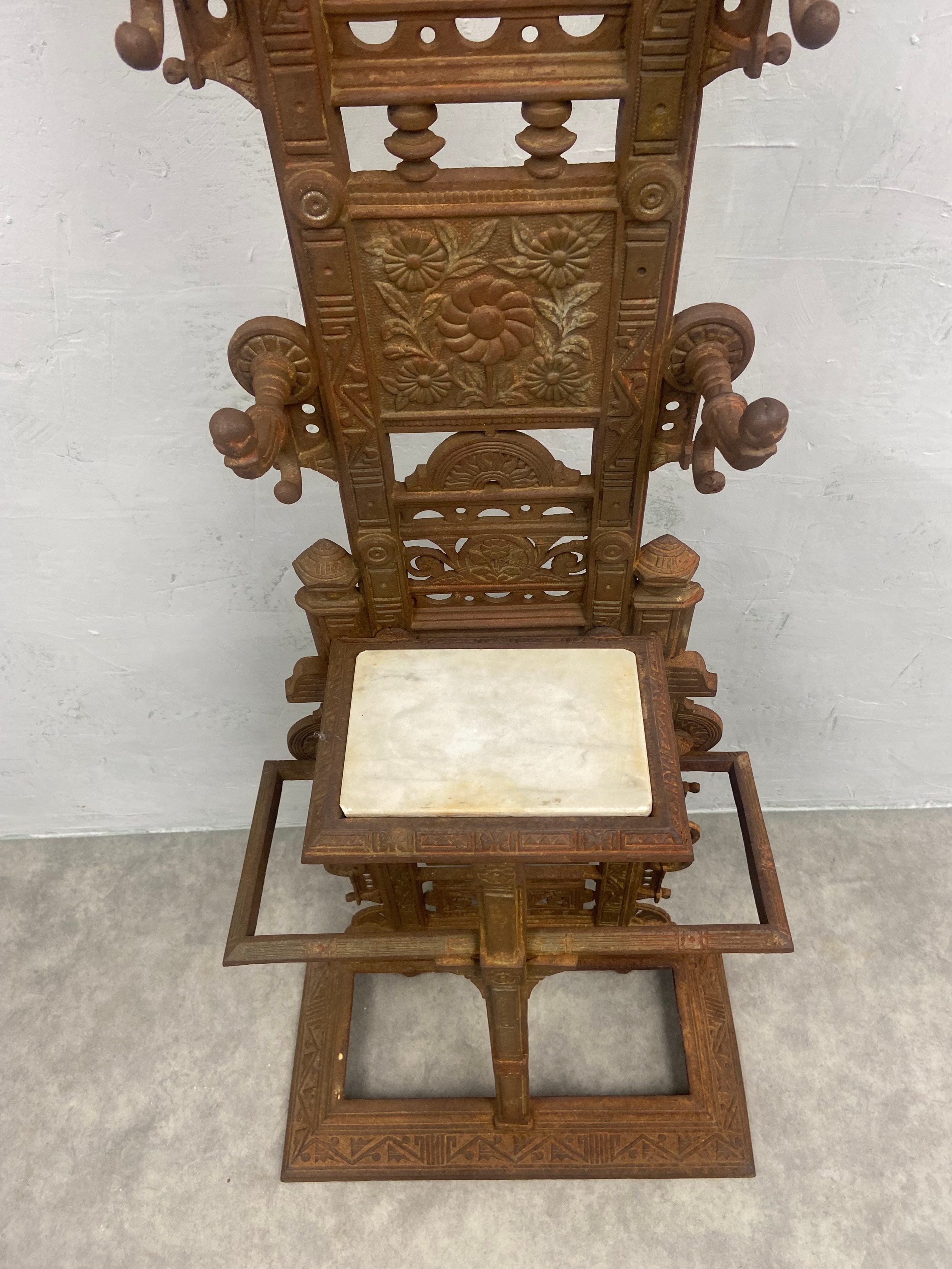 A Victorian cast iron hallstand fitted with mirror and marble shelf with foundry mark to the back. - Image 3 of 5