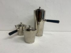 An Art Deco three piece coffee and cafe au lait service, chrome plated with ebony handles. H.24cm.