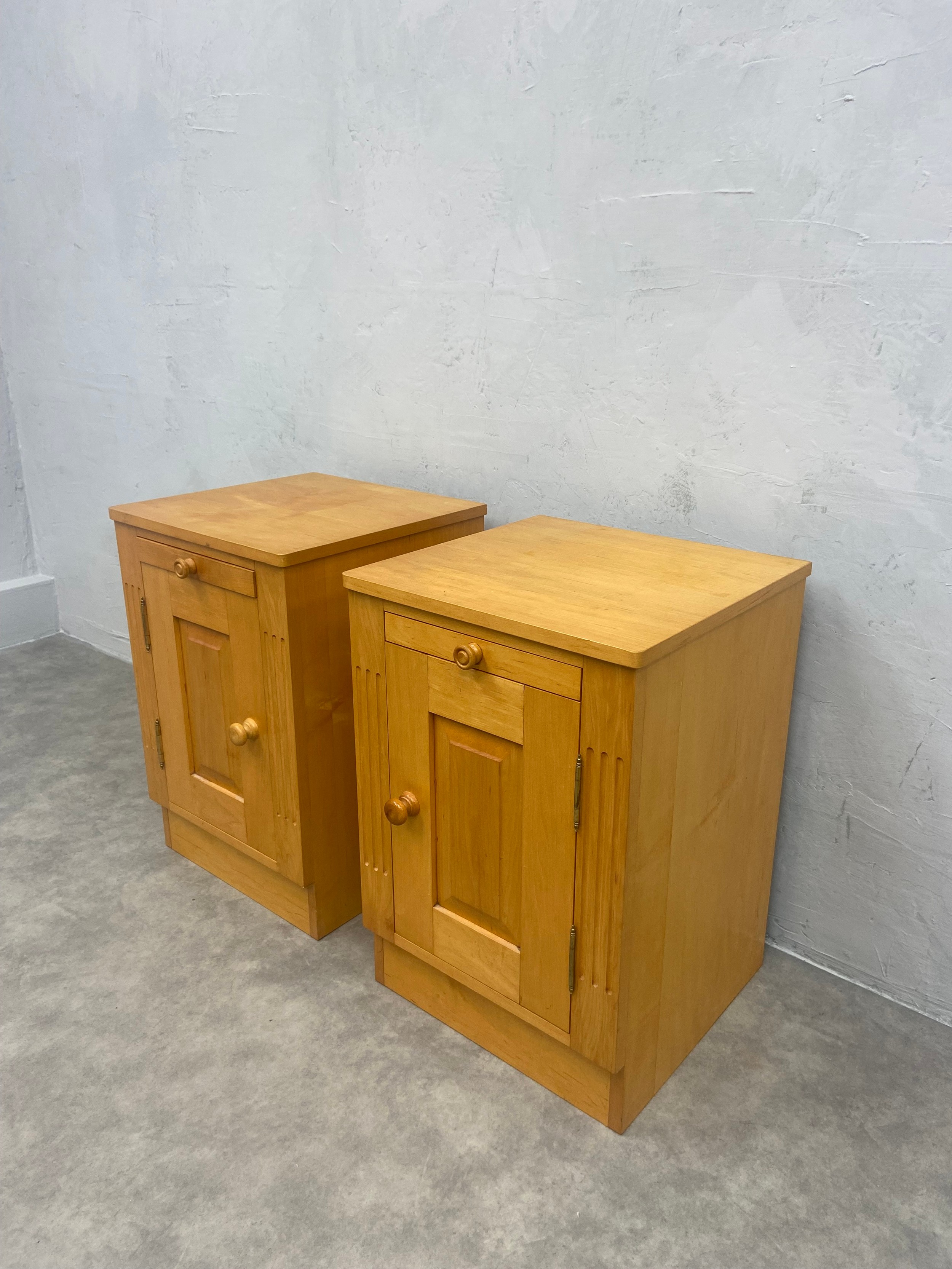 A pair of cotemporary maple bedside cabinets fitted with slides above panel doors. H.60 W.41 D.41cm. - Image 2 of 3