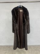 A Giuliana Teso full length ladies mink coat, size 10/12. In very good condition.