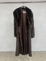 A Giuliana Teso full length ladies mink coat, size 10/12. In very good condition.