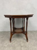 A late 19th century walnut occasional table with octagonal top on turned supports united by an