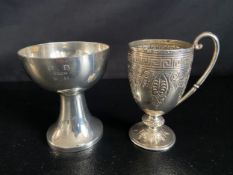 A silver goblet and an engraved cup, both bearing English hallmarks. 426g.