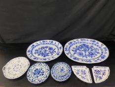 Two large Brown-Westhead Moore & Co. Meissen oval serving platters and two Villeroy & Boch serving