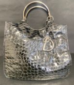 A Dior 61 tote bag black croc embossed patent leather with original Selfridges purchase card. 40 x