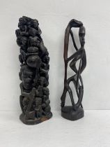 A Makonde hardwood tree of life carving along with a figural Shetani carving. H.54cm. (Tallest).