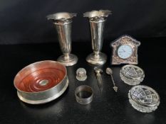 A pair of English hallmarked silver trumpet vases along with various hallmarked silver items. H.