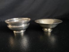 A small silver bowl with English hallmarks and a sterling silver similar. Dia.13cm. (Largest).